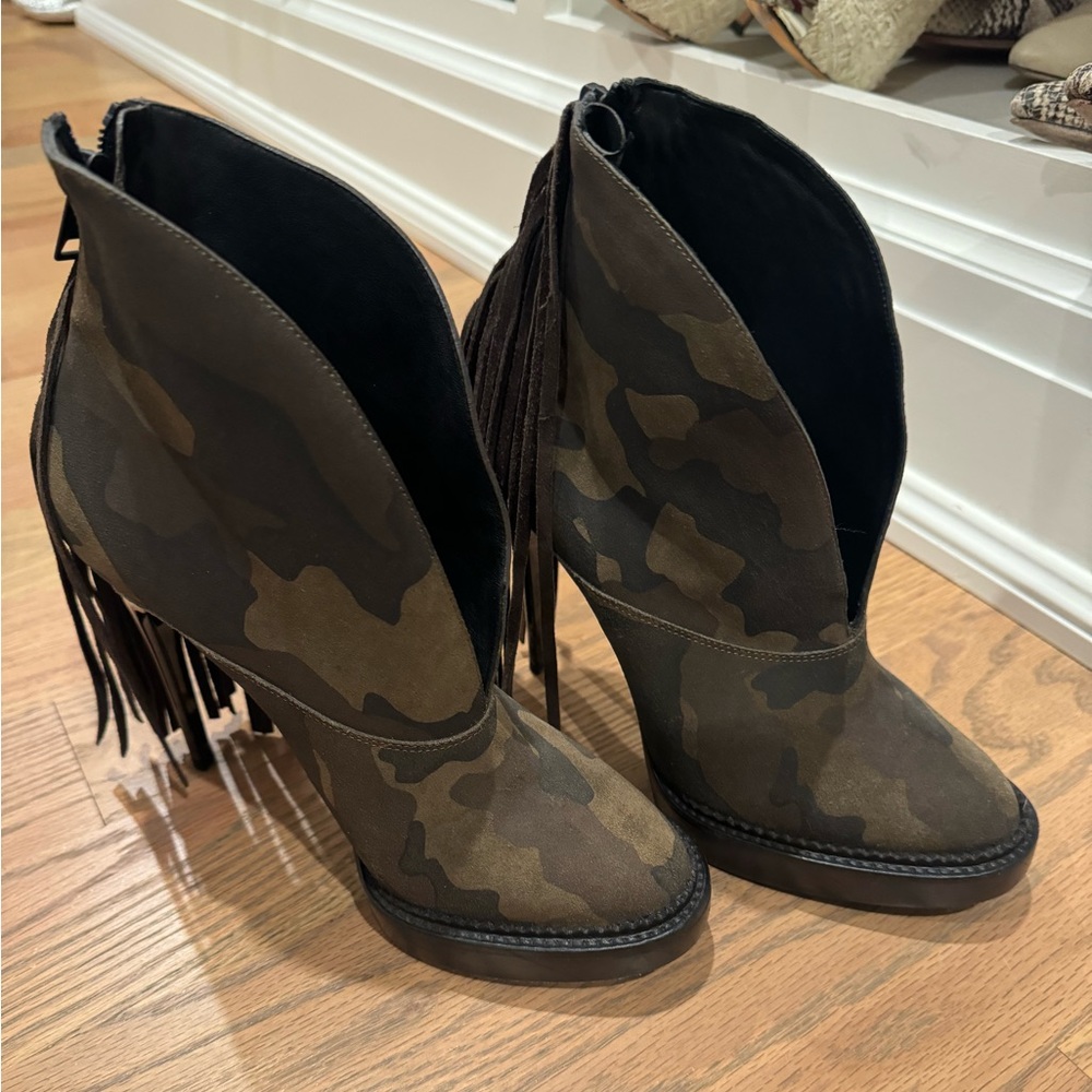 These sexy ankle boots are unique with the camouflage print and fringe.